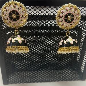 Jhumka black earnings. Pink meenakari and pearls.